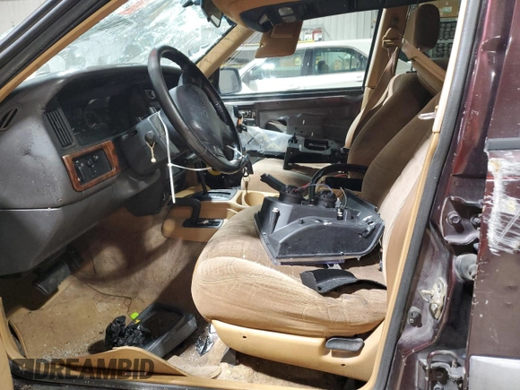 1996 Jeep Grand Cherokee Laredo with VIN 1J4GZ58Y1TC171915, listed as a Copart auction lot 50764034 with 0 mi miles and Salvage Title. Bid and sale history available at carsss.com. Image 7.