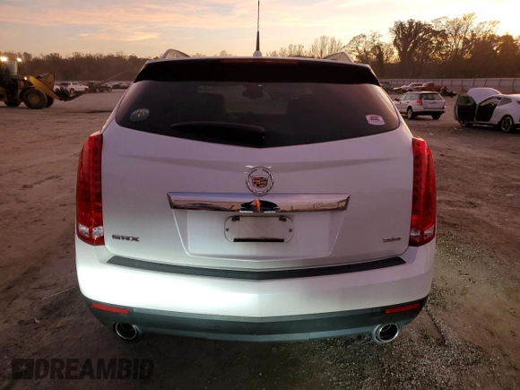 2012 Cadillac SRX with VIN 3GYFNGE35CS641479, listed as a Copart auction lot 80469584 with 32,433 mi miles and Salvage Title. Bid and sale history available at DreamBid. Image 6.