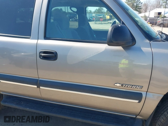 2003 Chevrolet Tahoe LS z VIN 1GNEK13T13J144304, wystawiony jako IAAI lot #41784000 z przebiegiem 363 478 mil mil oraz . Historia ofert i sprzedaży dostępna na DreamBid. Obrazek 6.