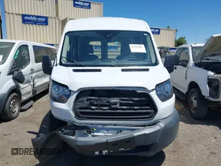 2018 Ford Transit with VIN 1FTYR2CM9JKA52056, listed as a IAAI auction lot 42542981 with 151,835 mi miles and . Bid and sale history available at DreamBid. Image 12.