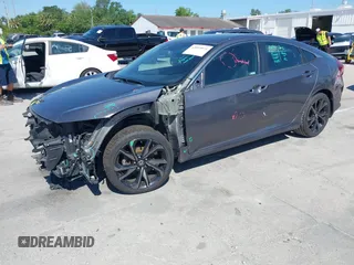 2019 Honda Civic Sport with VIN 19XFC2F89KE019683, listed as a IAAI auction lot 42055871 with 107,941 mi miles and . Bid and sale history available at DreamBid. Image 18.