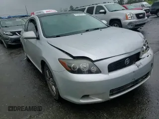 2008 Scion tC Spec z VIN JTKDE167280259526, wystawiony jako Copart lot #57526575 z przebiegiem 164 428 mil mil oraz Szkoda całkowita • Salvage title. Historia ofert i sprzedaży dostępna na DreamBid. Obrazek 13.