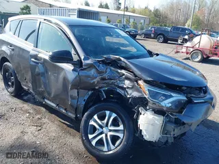 2018 Toyota RAV4 LE with VIN JTMBFREV0JJ732236, listed as a IAAI auction lot 41913555 with 60,432 mi miles. Bid and sale history available at carsss.com. Image 6.