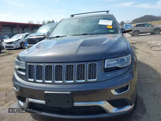 2014 Jeep Grand Cherokee Summit with VIN 1C4RJFJM5EC377129, listed as a IAAI auction lot 41763932 with 187,561 mi miles and . Bid and sale history available at DreamBid. Image 12.