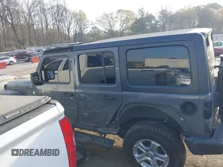 2019 Jeep Wrangler Unlimited Sport S с VIN 1C4HJXDNXKW521175, выставлен на аукционе IAAI как лот 41902053 с пробегом 56 184 миль миль и . История ставок и продаж доступна на DreamBid. Изображение 13.