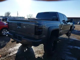 2015 Chevrolet Silverado 1500 LT with VIN 3GCUKREC9FG322269, listed as a IAAI auction lot 41298687 with 147,336 mi miles. Bid and sale history available at carsss.com. Image 4.