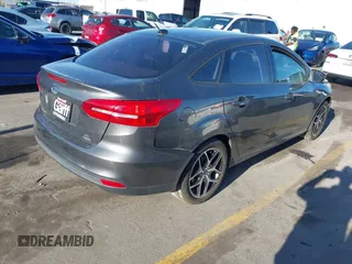 2018 Ford Focus SE with VIN 1FADP3FE0JL270966, listed as a IAAI auction lot 42206548 with 89,067 mi miles and . Bid and sale history available at DreamBid. Image 4.