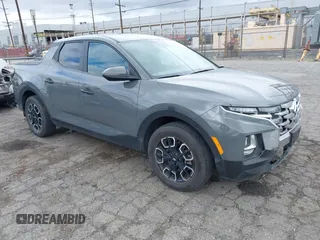 2022 Hyundai Santa Cruz SEL z VIN 5NTJBDAE6NH003514, wystawiony jako IAAI lot #41774505 z przebiegiem 40 788 mil mil oraz . Historia ofert i sprzedaży dostępna na DreamBid. Obrazek 1.