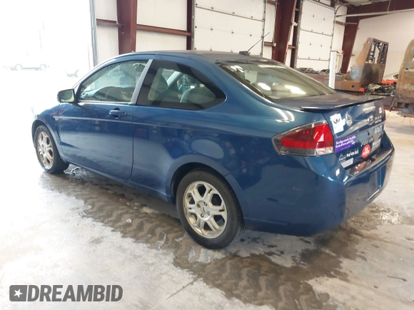 2009 Ford Focus SE with VIN 1FAHP32N09W244420, listed as a IAAI auction lot 41952030 with 165,886 mi miles. Bid and sale history available at carsss.com. Image 3.