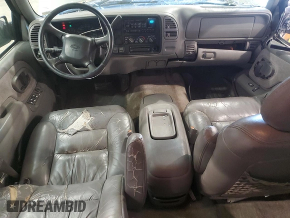 1999 Chevrolet Suburban z VIN 3GNFK16R4XG250550, wystawiony jako Copart lot #51941515 z przebiegiem 202 667 mil mil oraz Szkoda całkowita • Salvage title. Historia ofert i sprzedaży dostępna na DreamBid. Obrazek 8.