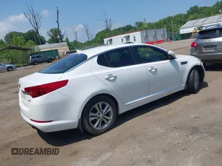 2013 Kia Optima EX z VIN 5XXGN4A70DG091603, wystawiony jako IAAI lot #42449685 z przebiegiem 167 384 mil mil oraz . Historia ofert i sprzedaży dostępna na DreamBid. Obrazek 4.