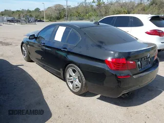 2014 BMW 5 Series 535d with VIN WBAXA5C58ED690447, listed as a IAAI auction lot 41577468 with 149,080 mi miles and . Bid and sale history available at carsss.com. Image 3.