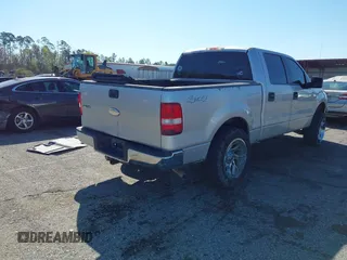 2006 Ford F-150 XLT with VIN 1FTPW14V76FB19002, listed as a IAAI auction lot 41734432 with 165,127 mi miles and . Bid and sale history available at carsss.com. Image 4.