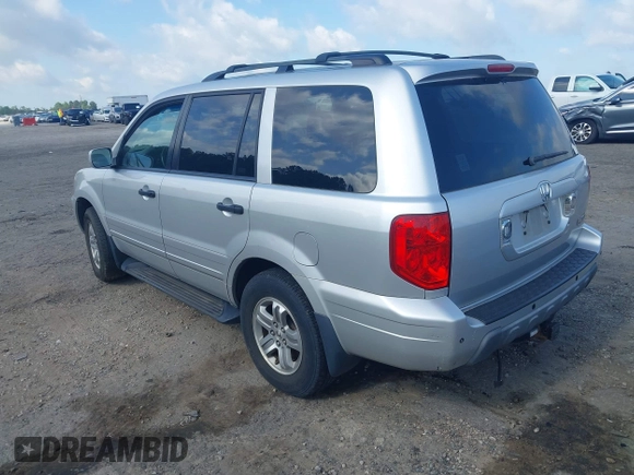 2005 Honda Pilot EX-L z VIN 2HKYF18665H558980, wystawiony jako IAAI lot #42316215 z przebiegiem 207 288 mil mil oraz . Historia ofert i sprzedaży dostępna na DreamBid. Obrazek 3.