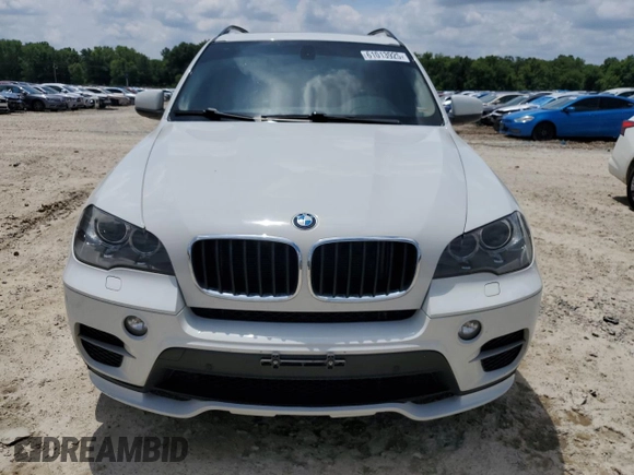 2012 BMW X5 35i с VIN 5UXZV4C58CL987049, выставлен на аукционе Copart как лот 61013925 с пробегом 167 508 миль миль и Чистый • Clean title. История ставок и продаж доступна на DreamBid. Изображение 5.