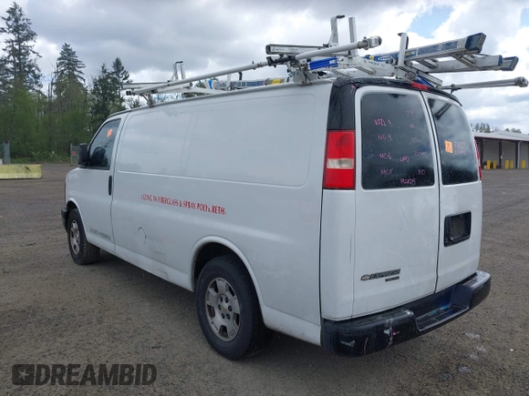 2013 Chevrolet Express Cargo Van with VIN 1GCSGAFX0D1111985, listed as a IAAI auction lot 42065556 with 243,671 mi miles. Bid and sale history available at carsss.com. Image 3.