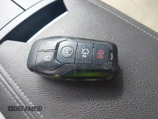 2015 Lincoln MKZ z VIN 3LN6L2JK4FR623686, wystawiony jako IAAI lot #41721095 z przebiegiem 197 922 mil mil oraz . Historia ofert i sprzedaży dostępna na DreamBid. Obrazek 11.