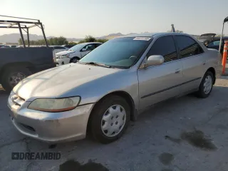 1999 Honda Accord LX with VIN JHMCG6653XC010401, listed as a Copart auction lot 64072745 with 246,518 mi miles and Salvage title. Bid and sale history available at DreamBid. Image 1.