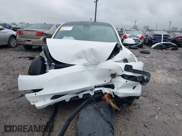 2022 Tesla Model 3 Long Range with VIN 5YJ3E1EB0NF129945, listed as a IAAI auction lot 41965531 with 59,162 mi miles and . Bid and sale history available at DreamBid. Image 12.