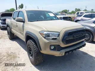 2019 Toyota Tacoma SR with VIN 3TMCZ5AN3KM232103, listed as a IAAI auction lot 41929297 with 71,961 mi miles and . Bid and sale history available at DreamBid. Image 1.
