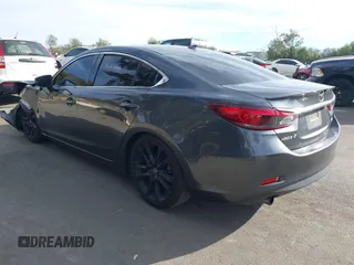 2016 Mazda Mazda6 i Grand Touring with VIN JM1GJ1W57G1441102, listed as a IAAI auction lot 41687057 with 144,876 mi miles. Bid and sale history available at carsss.com. Image 3.