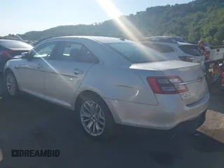 2014 Ford Taurus Limited with VIN 1FAHP2F8XEG133523, listed as a IAAI auction lot 40285220 with 134,939 mi miles. Bid and sale history available at carsss.com. Image 3.