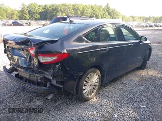 2013 Ford Fusion SE Hybrid с VIN 3FA6P0LU1DR208081, выставлен на аукционе IAAI как лот 42559905 с пробегом 149 340 миль миль и . История ставок и продаж доступна на DreamBid. Изображение 4.