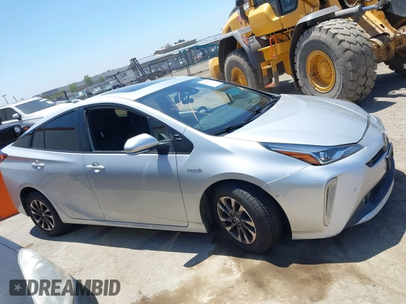 2022 Toyota Prius L Eco with VIN JTDKAMFU5N3188107, listed as a IAAI auction lot 42223649 with 180,894 mi miles and . Bid and sale history available at DreamBid. Image 14.