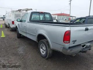 1998 Ford F-150 Standard with VIN 1FTZF18W2WNC27724, listed as a IAAI auction lot 41501654 with 336,342 mi miles. Bid and sale history available at carsss.com. Image 3.