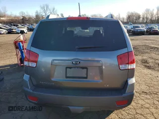 2009 Kia Borrego LX with VIN KNDJH741795017158, listed as a Copart auction lot 42489845 with 116,336 mi miles and Salvage Title. Bid and sale history available at DreamBid. Image 6.