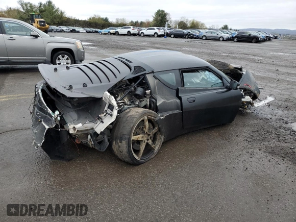 2021 Lotus Evora GT z VIN SCCLMDDN5MHA10403, wystawiony jako Copart lot #52484955 z przebiegiem Nie podano mil oraz Szkoda całkowita • Salvage title. Historia ofert i sprzedaży dostępna na DreamBid. Obrazek 3.