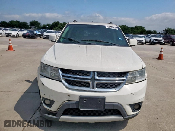 2012 Dodge Journey SXT z VIN 3C4PDCBG9CT213423, wystawiony jako Copart lot #65246735 z przebiegiem 319 806 mil mil oraz Szkoda całkowita • Salvage title. Historia ofert i sprzedaży dostępna na DreamBid. Obrazek 5.