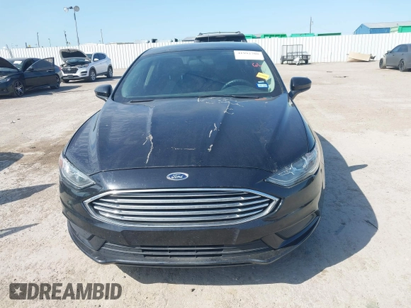 2018 Ford Fusion SE z VIN 3FA6P0H74JR125761, wystawiony jako IAAI lot #41992708 z przebiegiem 102 242 mil mil oraz . Historia ofert i sprzedaży dostępna na DreamBid. Obrazek 12.