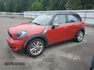 2014 MINI Countryman S with VIN WMWZC3C53EWP25410, listed as a Copart auction lot 62900915 with 122,088 mi miles and Clean title. Bid and sale history available at DreamBid. Image 1.