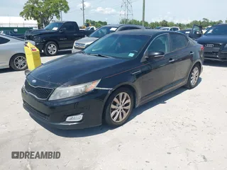 2014 Kia Optima EX with VIN 5XXGN4A72EG294381, listed as a IAAI auction lot 41944473 with 119,781 mi miles and . Bid and sale history available at carsss.com. Image 2.