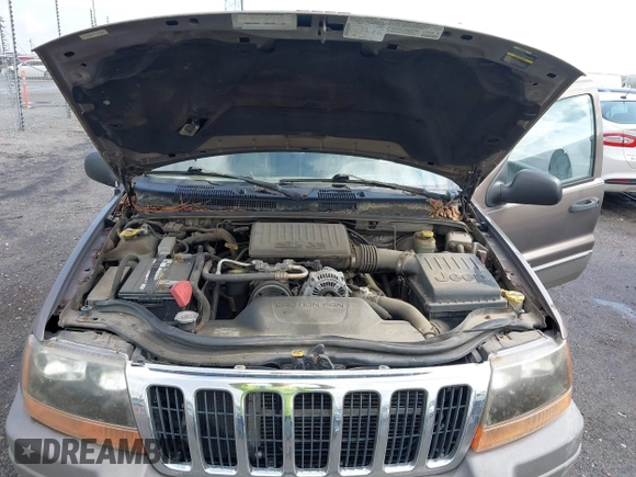 2001 Jeep Grand Cherokee Laredo z VIN 1J4GX48N51C548958, wystawiony jako IAAI lot #42460303 z przebiegiem 210 379 mil mil oraz . Historia ofert i sprzedaży dostępna na DreamBid. Obrazek 10.