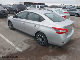2015 Nissan Sentra S with VIN 3N1AB7AP0FY231596, listed as a IAAI auction lot 42086308 with 220,451 mi miles. Bid and sale history available at carsss.com. Image 3.
