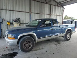 2004 Dodge Dakota SLT with VIN 1D7GL42N14S676687, listed as a Copart auction lot 72150124 with 162,913 mi miles and Salvage Title. Bid and sale history available at carsss.com. Image 1.