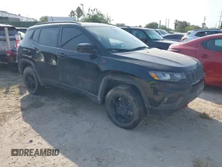2024 Jeep Compass Trailhawk with VIN 3C4NJDDN1RT579192, listed as a IAAI auction lot 41930493 with 37,627 mi miles and . Bid and sale history available at DreamBid. Image 1.