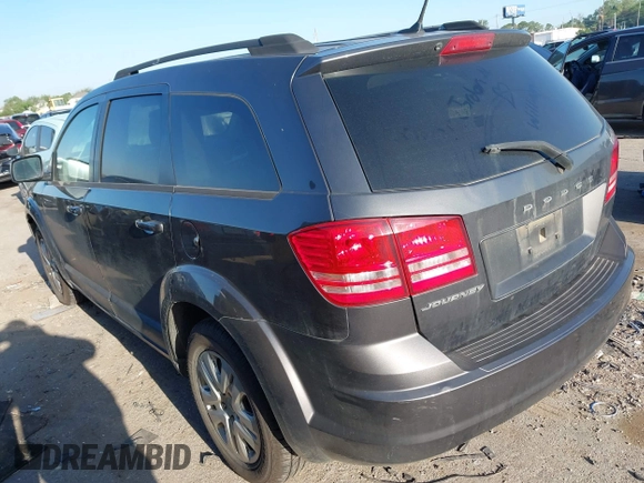 2017 Dodge Journey SE z VIN 3C4PDCAB9HT551840, wystawiony jako IAAI lot #41977338 z przebiegiem 202 856 mil mil oraz . Historia ofert i sprzedaży dostępna na DreamBid. Obrazek 3.