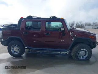 2006 Hummer H2 with VIN 5GRGN22U66H104237, listed as a IAAI auction lot 41665284 with 61,984 mi miles. Bid and sale history available at carsss.com. Image 13.