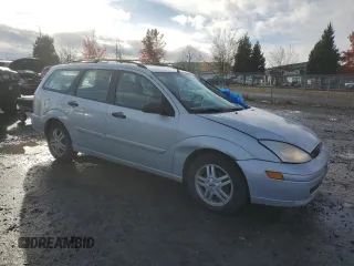 2000 Ford Focus SE Fleet с VIN 1FAHP3639YW261420, выставлен на аукционе Copart как лот 80135064 с пробегом 153 418 миль миль и Списание • Salvage title. История ставок и продаж доступна на DreamBid. Изображение 4.