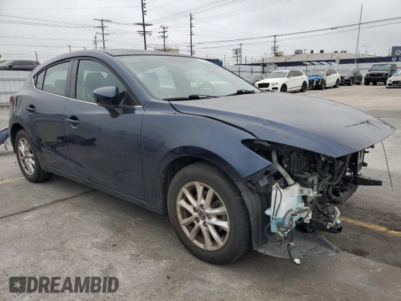 2015 Mazda 3 i Touring with VIN 3MZBM1L73FM145189, listed as a Copart auction lot 59802275 with 84,625 mi miles and Salvage title. Bid and sale history available at DreamBid. Image 4.