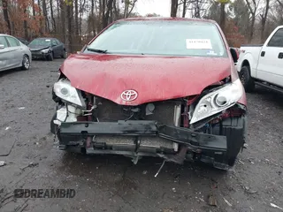 2014 Toyota Sienna XLE with VIN 5TDYK3DC0ES510579, listed as a IAAI auction lot 41470424 with 304,620 mi miles and . Bid and sale history available at DreamBid. Image 12.