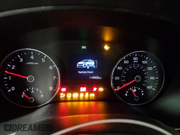 2020 Kia Sportage EX with VIN KNDPNCAC7L7631897, listed as a Copart auction lot 55474655 with 114,403 mi miles and Salvage title. Bid and sale history available at DreamBid. Image 9.