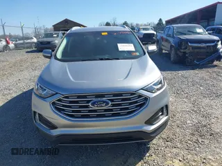 2020 Ford Edge SEL z VIN 2FMPK4J93LBB01318, wystawiony jako IAAI lot #42038334 z przebiegiem 73 435 mil mil oraz . Historia ofert i sprzedaży dostępna na DreamBid. Obrazek 12.