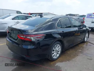 2023 Toyota Camry LE z VIN 4T1C11AK3PU182887, wystawiony jako IAAI lot #42156807 z przebiegiem 33 019 mil mil oraz . Historia ofert i sprzedaży dostępna na DreamBid. Obrazek 4.