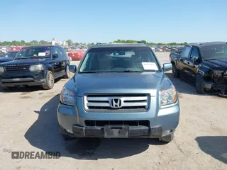 2006 Honda Pilot EX-L with VIN 2HKYF18506H521822, listed as a IAAI auction lot 42012612 with 187,946 mi miles and . Bid and sale history available at DreamBid. Image 12.