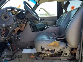 2004 Chevrolet Tahoe Z71 z VIN 1GNEK13Z64R270410, wystawiony jako Copart lot #58807635 z przebiegiem Nie podano mil oraz Szkoda całkowita • Salvage title. Historia ofert i sprzedaży dostępna na DreamBid. Obrazek 7.