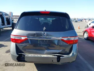 2011 Honda Odyssey EX-L with VIN 5FNRL5H6XBB083980, listed as a IAAI auction lot 42100308 with 191,361 mi miles and . Bid and sale history available at carsss.com. Image 6.